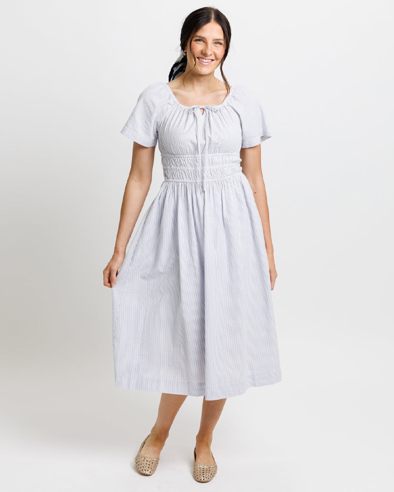 Maybelle Dress – model seated to show relaxed shape and comfort of fit