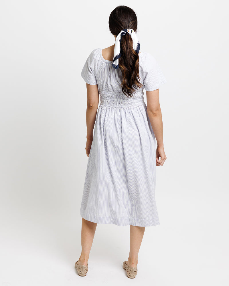 Maybelle Dress – back view showing flowy cotton design and clean silhouette