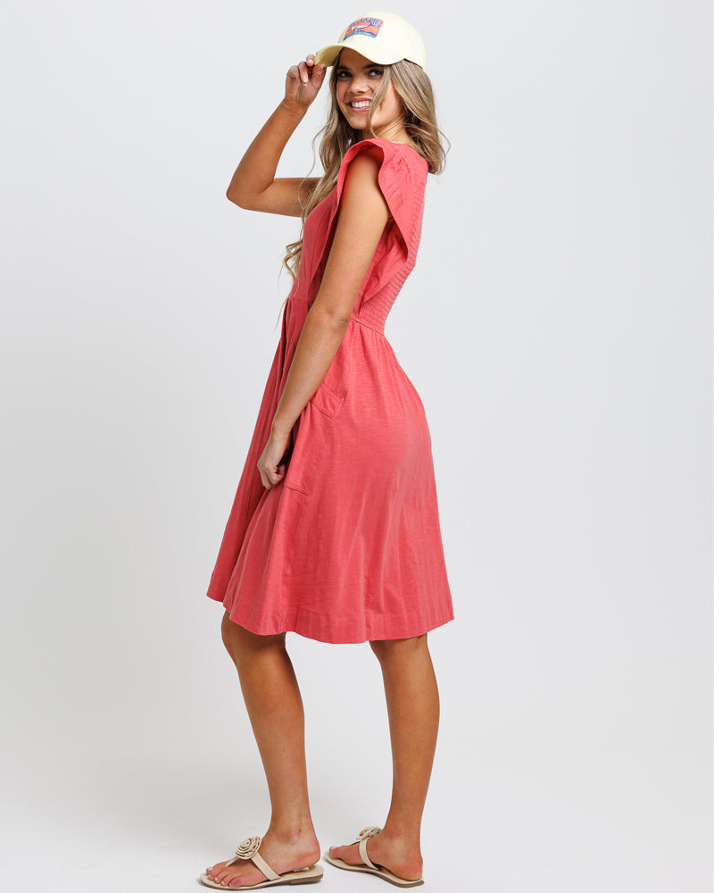 model showcasing a comfortable pink dress