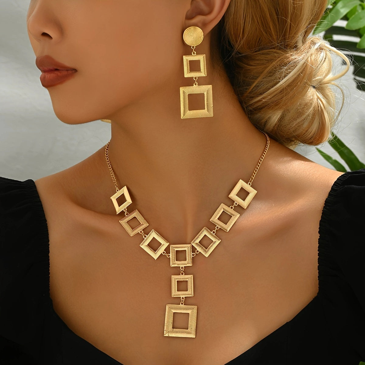 Gold square necklace and earrings