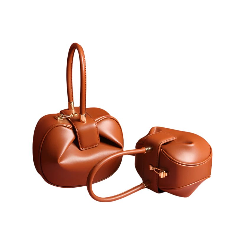Luxurious cowhide leather dumpling bag with modern design