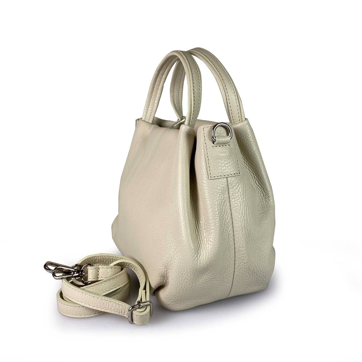 Beige handbag with a shoulder strap on a white background