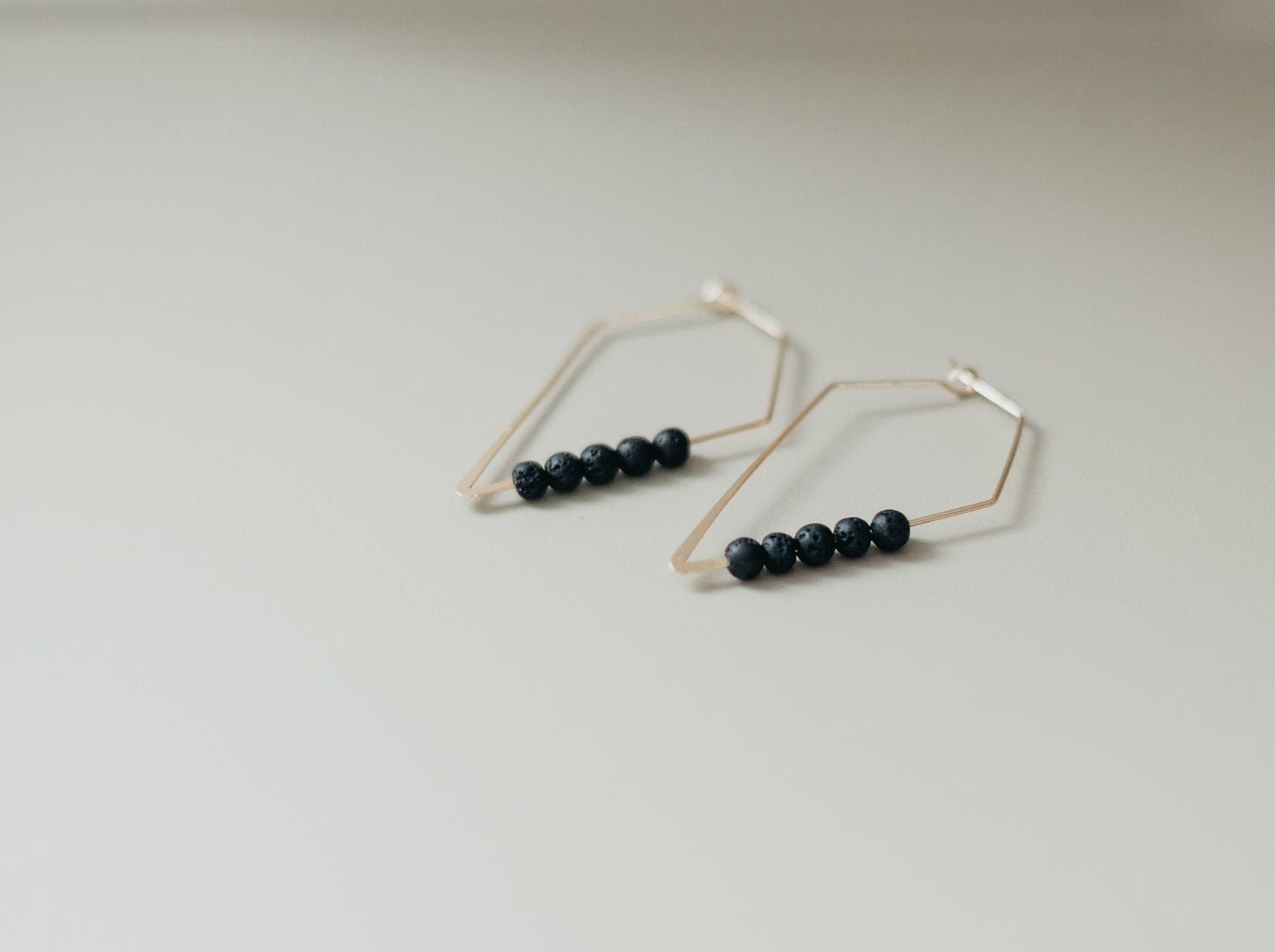 Handmade earrings with 5 lava beads each