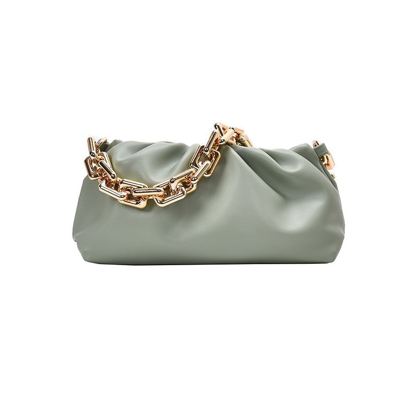 Green handbag with gold chain