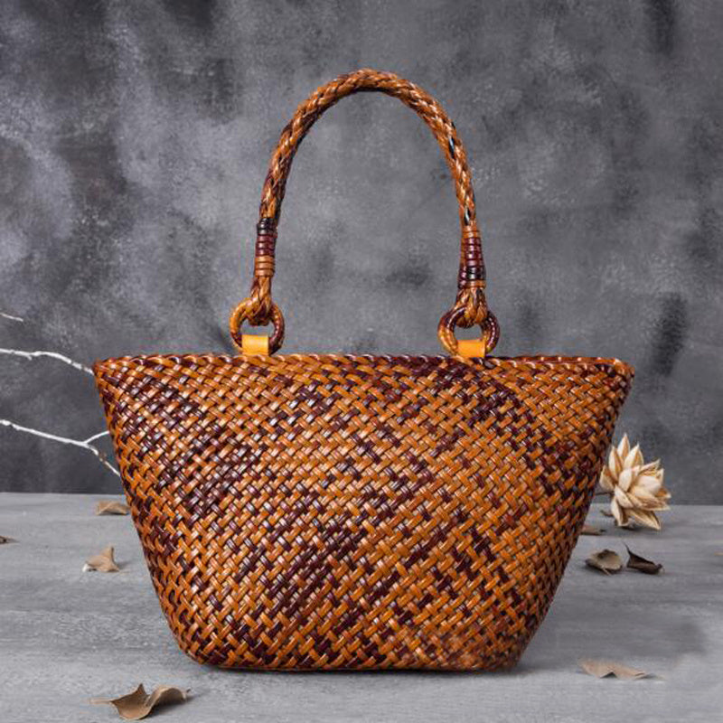 Woven leather handbag with braided handle