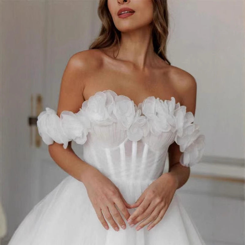 Lace mini bridal gown with off-shoulder neckline in ivory — front view