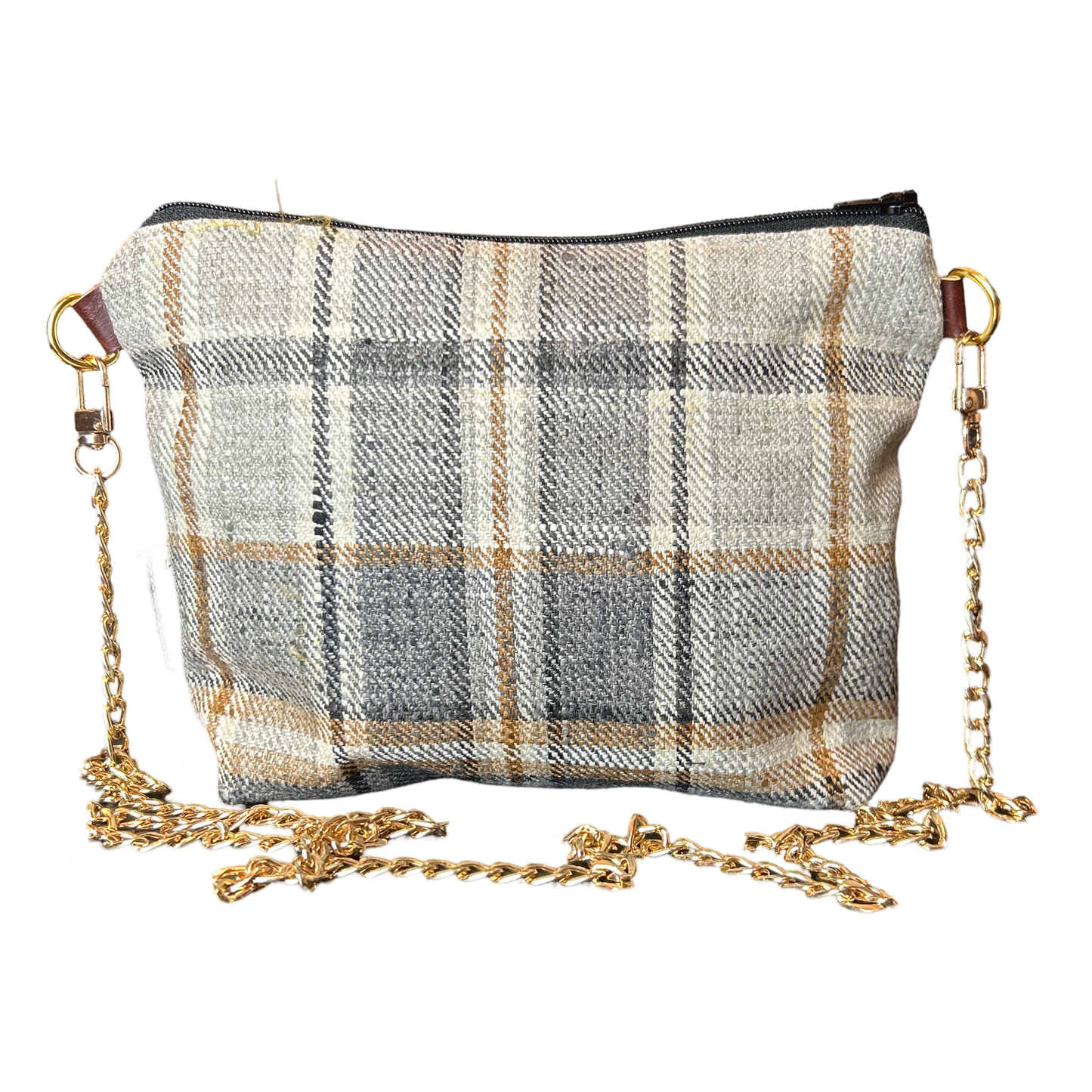 Plaid handbag with gold chain strap on a white background