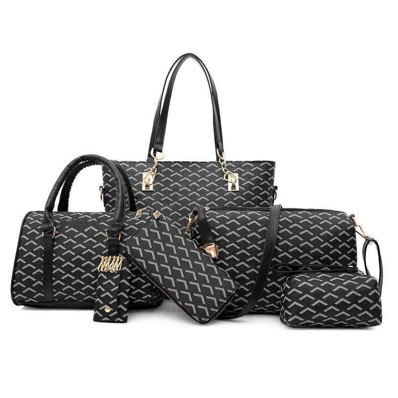 Set of black handbags with geometric pattern