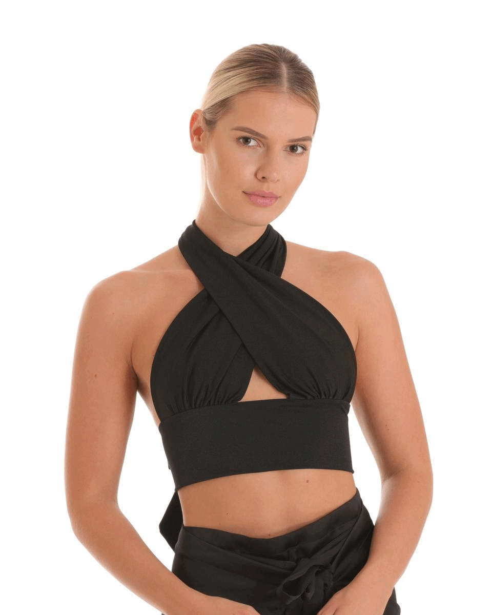 Blond girl wearing a black 8-Way Top  –