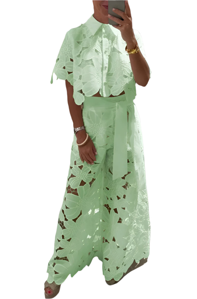 woman wearing a light green lace outfit set