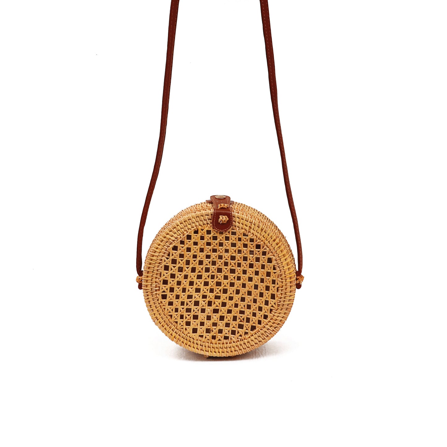 Round woven bag with a brown strap