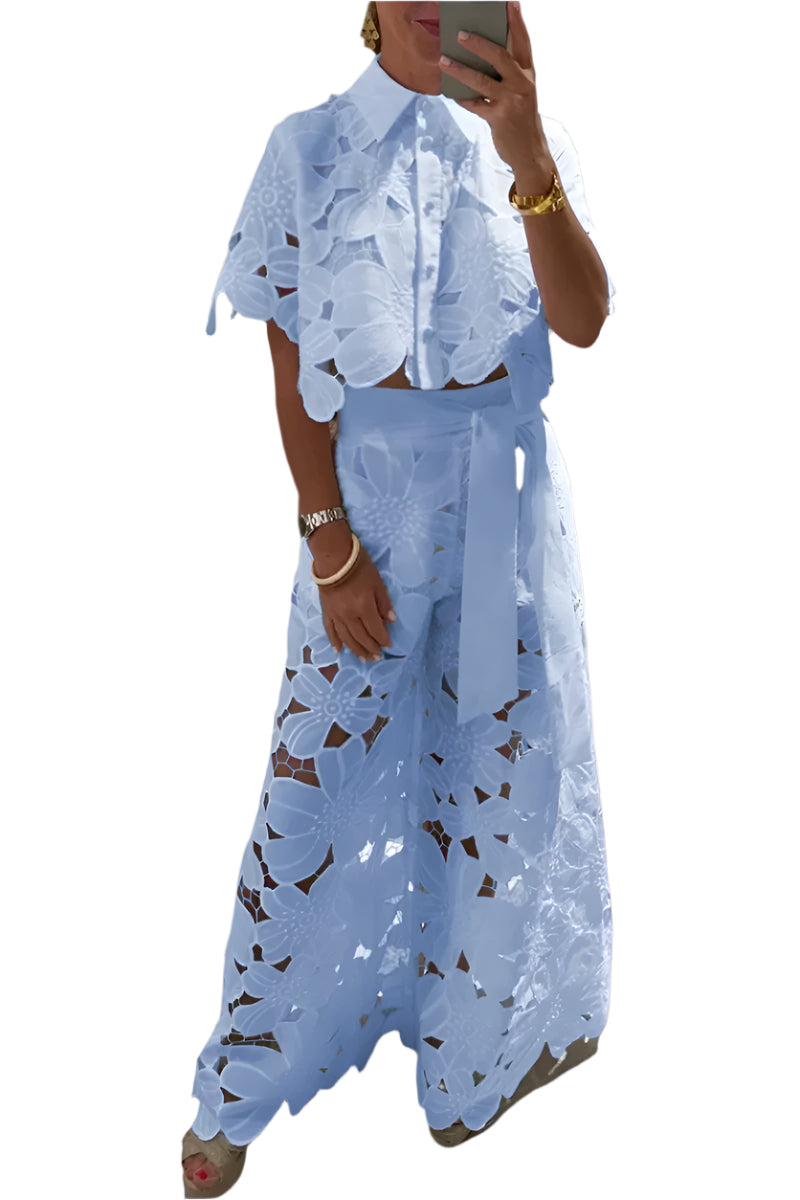Person wearing a blue lace outfit set