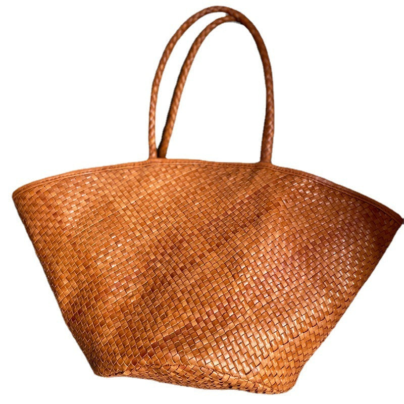 Brown woven leather handbag