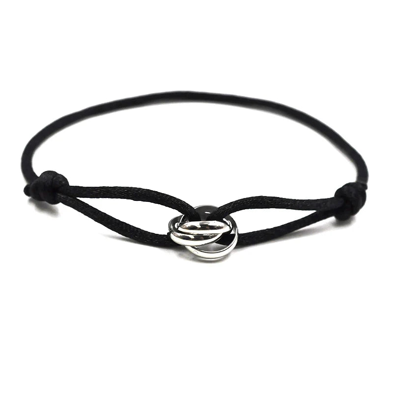 Black cord bracelet with a silver clasp