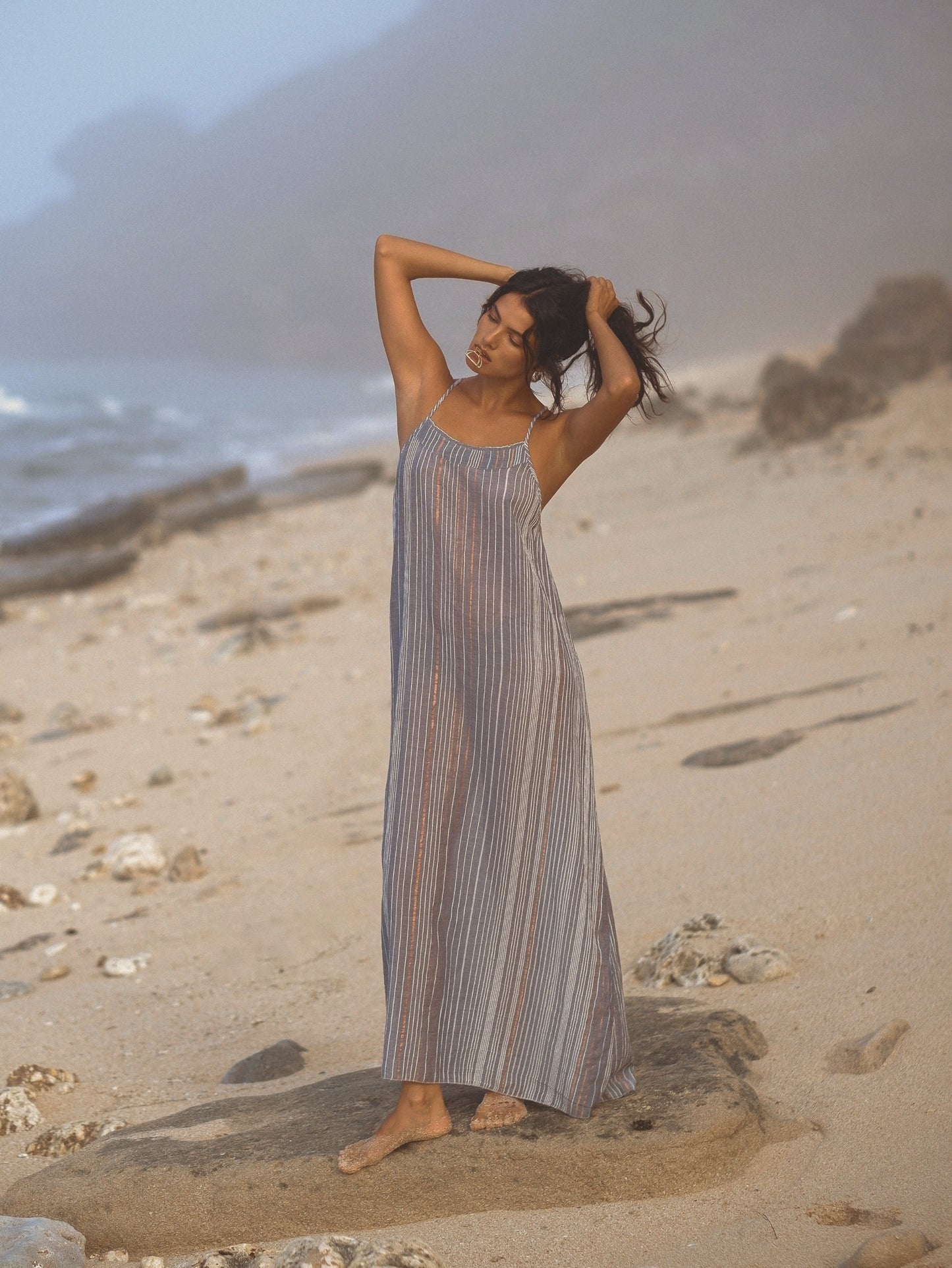 A gorgeous striped dress on a woman