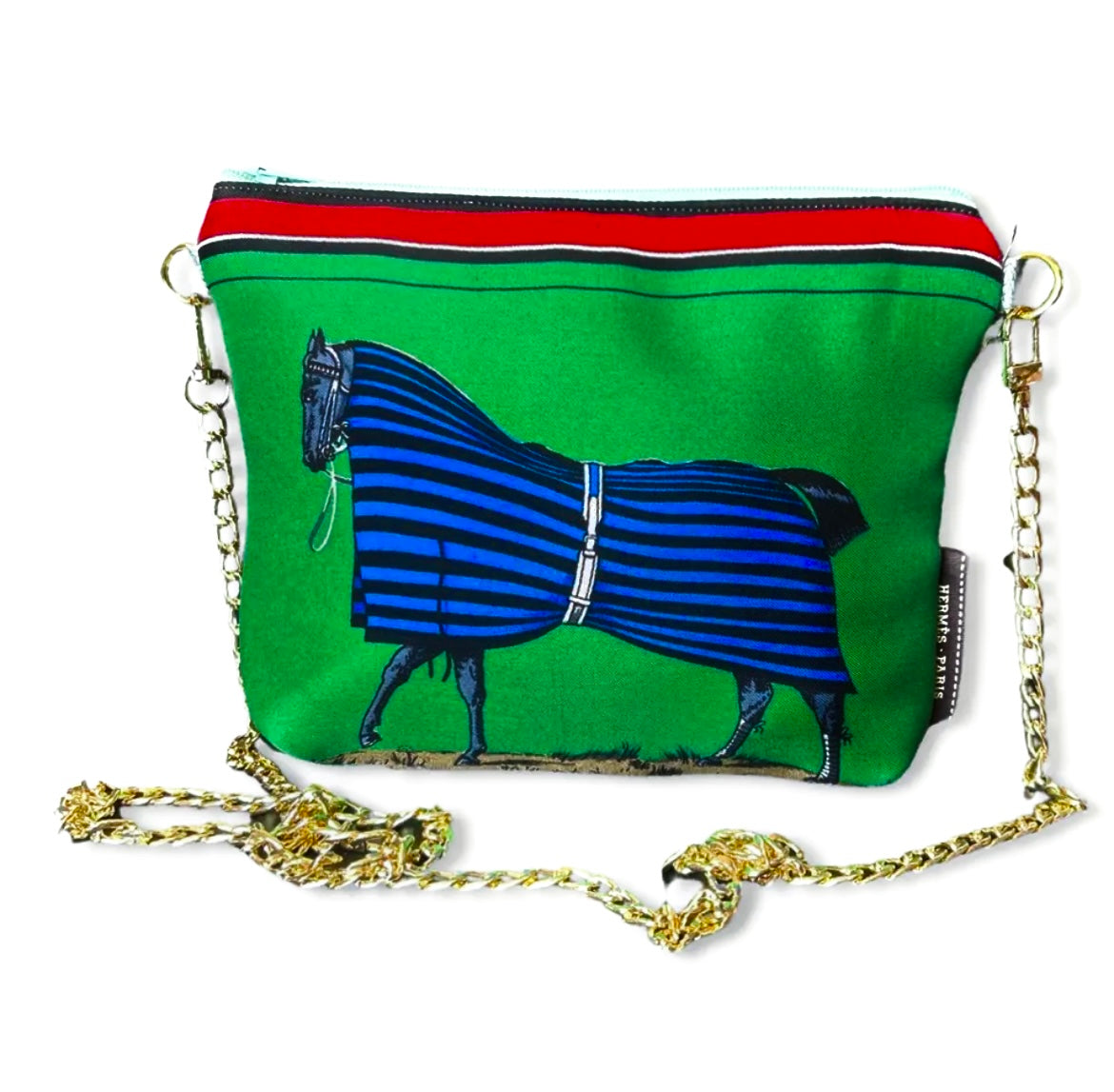 Green handbag with a horse and bow design on a white background