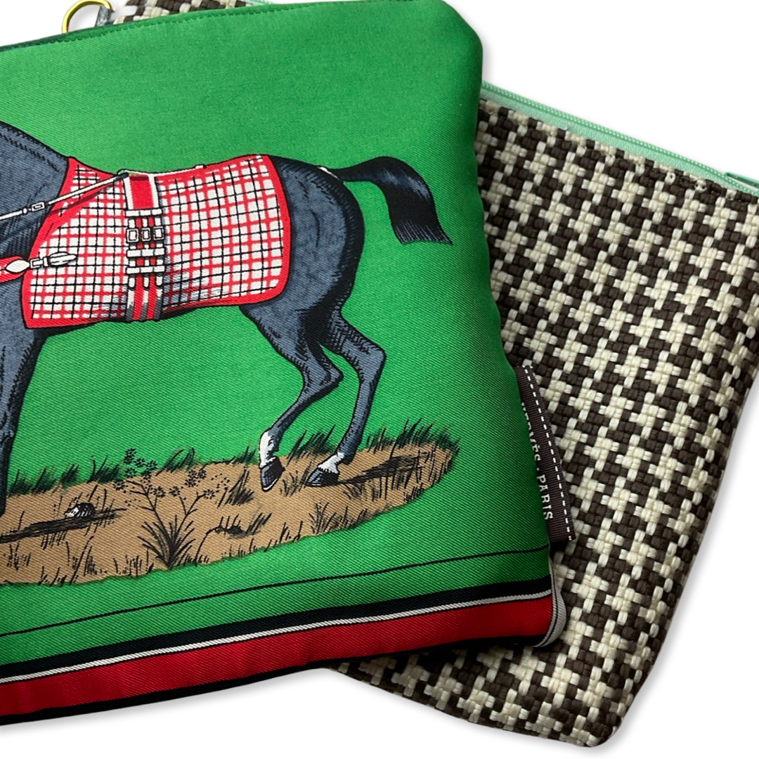 Green fabric with horse and saddle design next to a checkered pattern