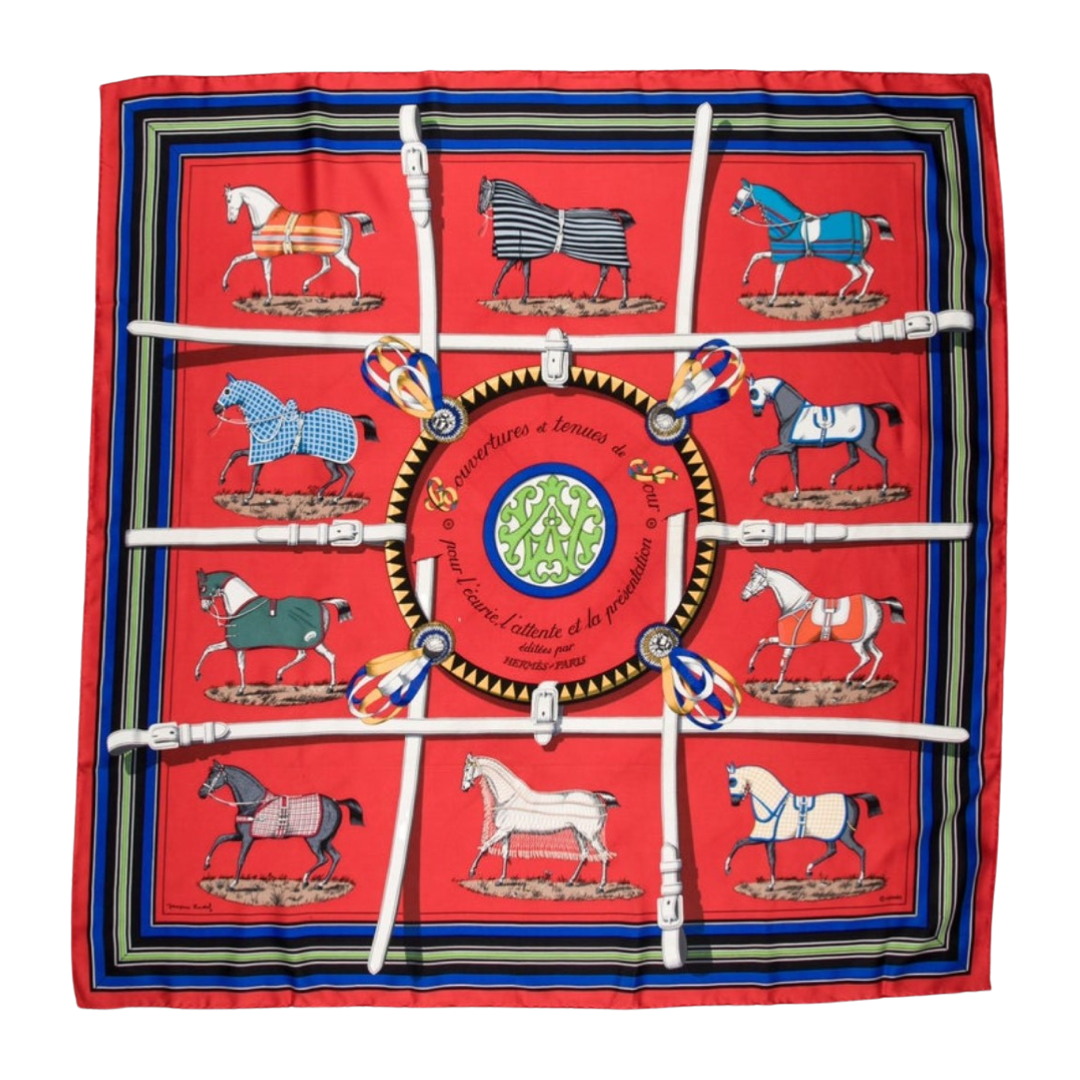 Red scarf with horse illustrations and a central emblem on a white background