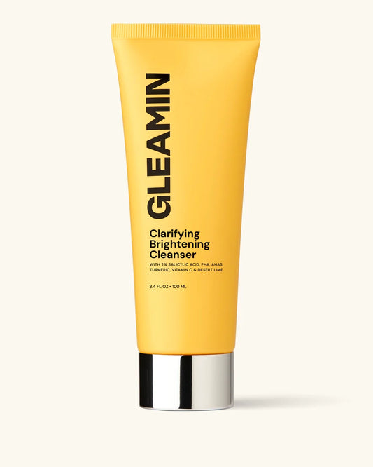 Yellow tube of Gleamin Clarifying Brightening Cleanser on a white background Yellow tube of Gleamin Clarifying Brightening Cleanser on a white background