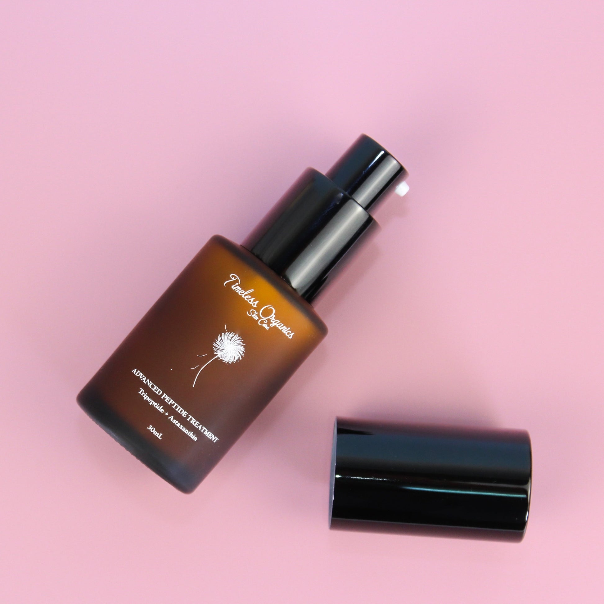 Skincare bottle with black cap of a nourishing peptide treatment for skincare