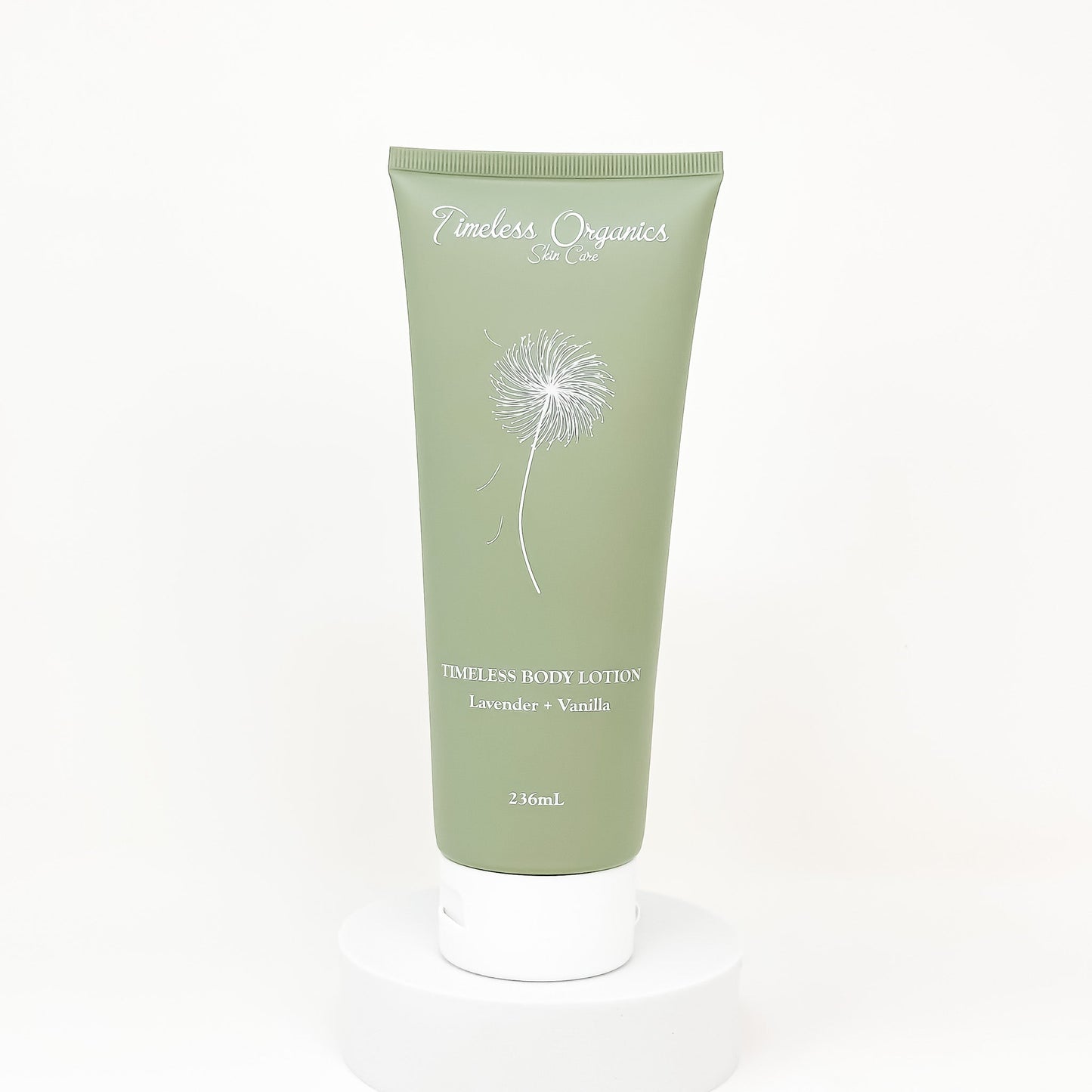 Green body lotion tube with dandelion design to moisturize stubborn dry skin