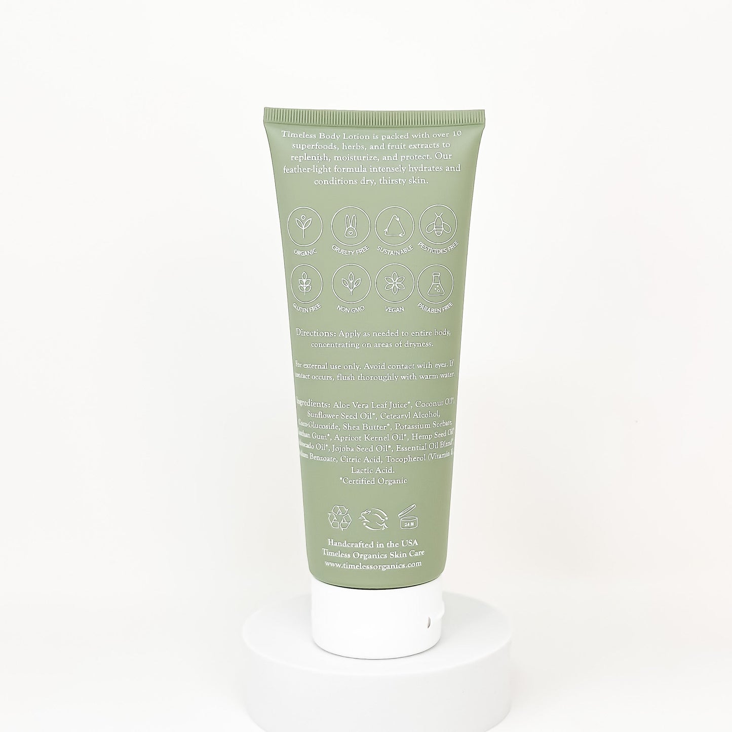 Back of Green tube of skincare product with text