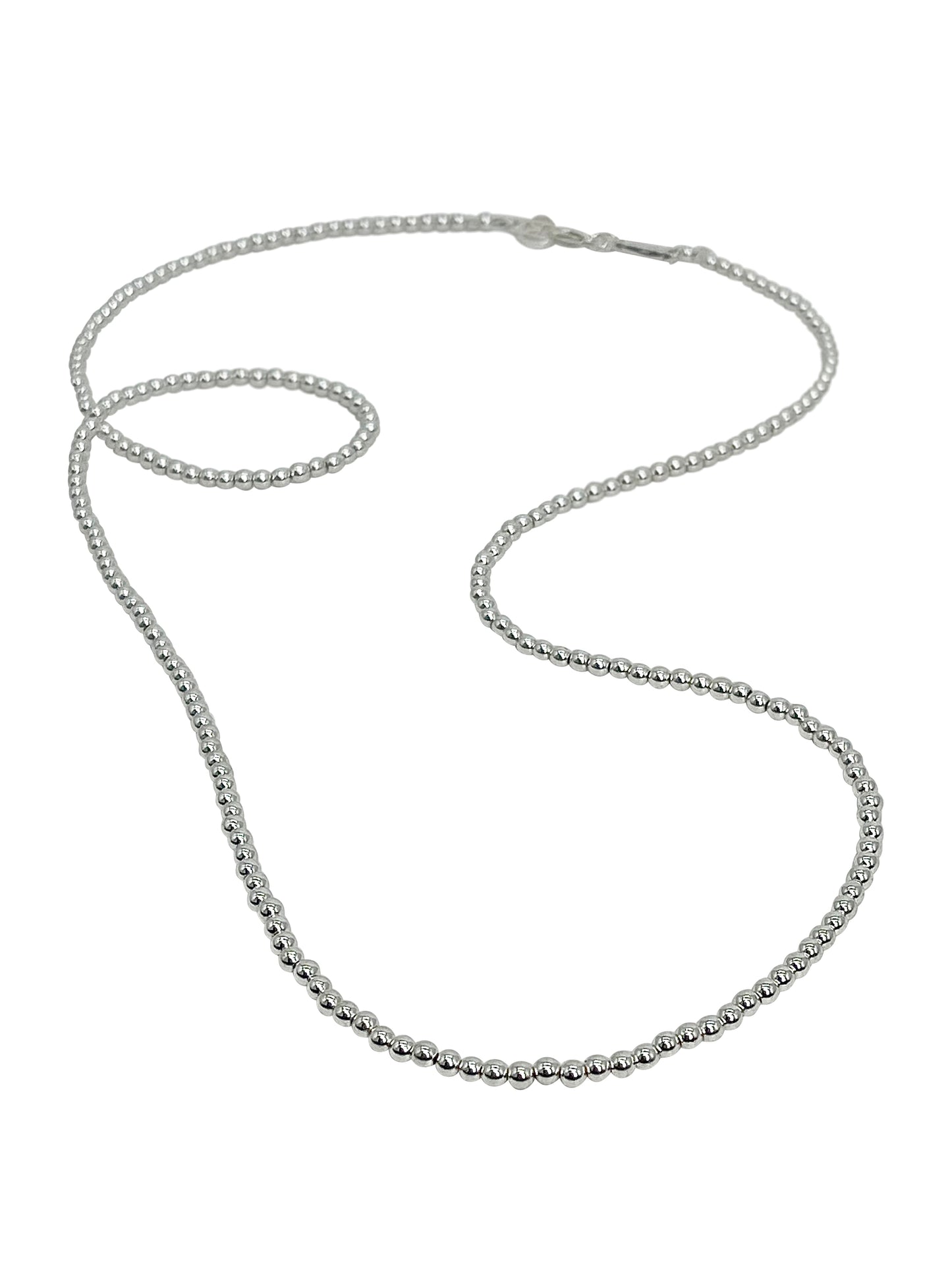 Silver chain necklace on a white background