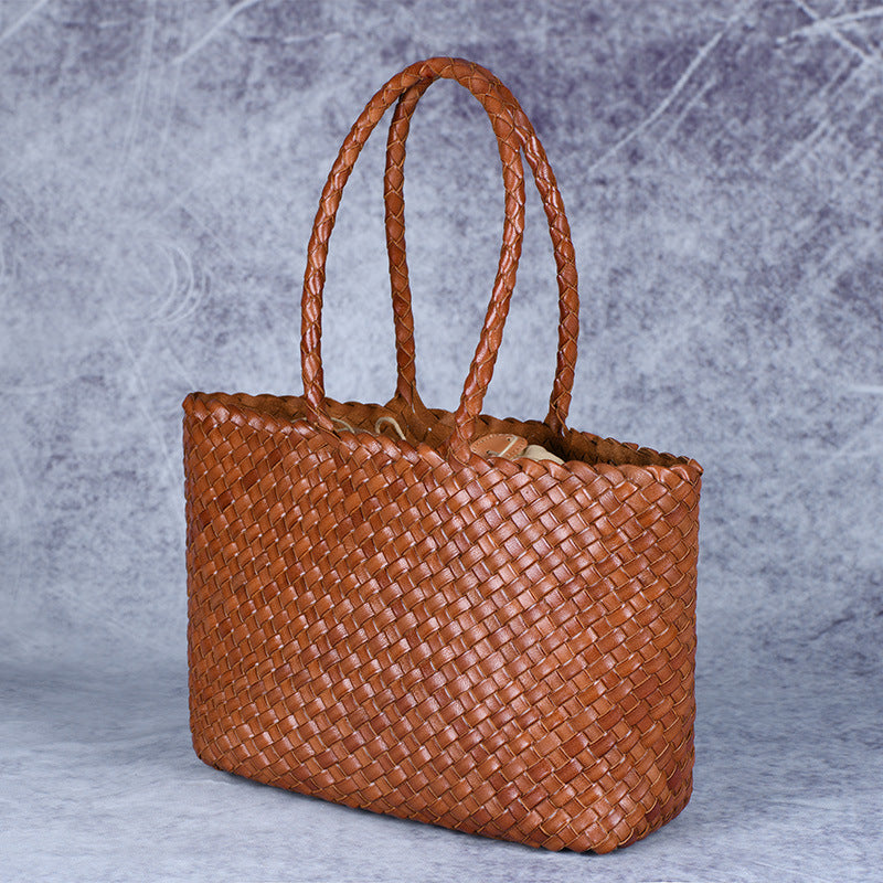 Brown woven leather handbag