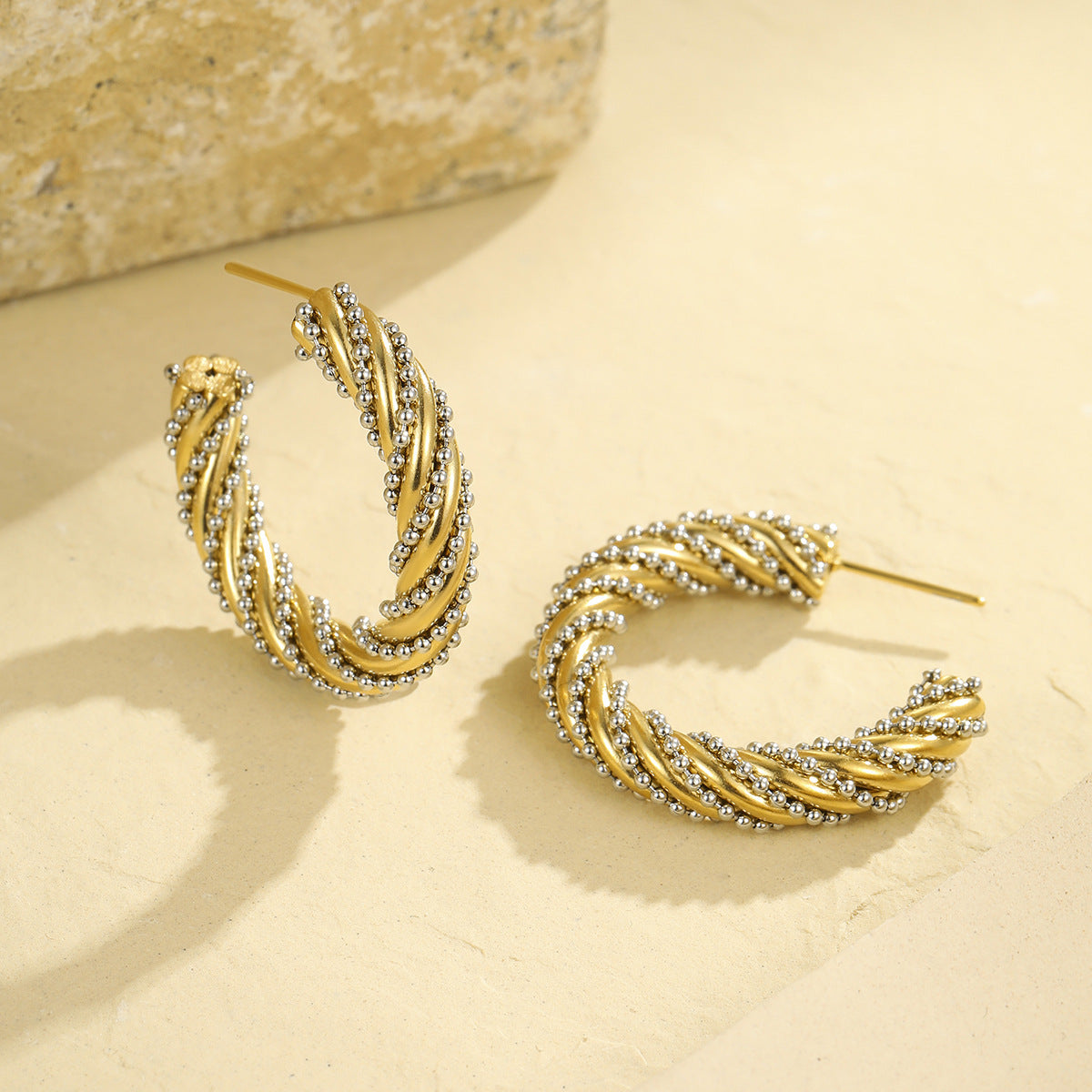 Gold hoop earrings with diamond accents