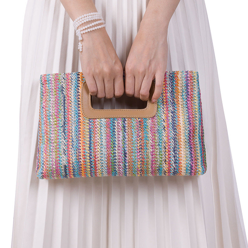 Multicolored striped clutch