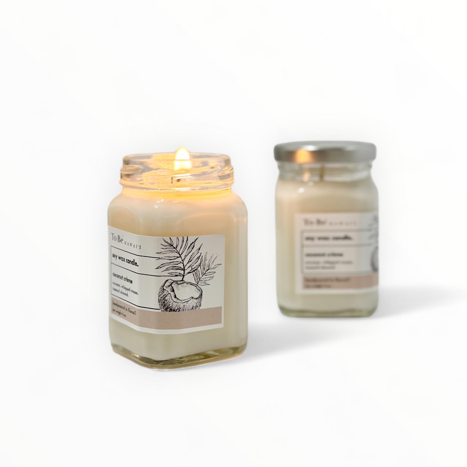 Two small glass candles with with organic ingredients