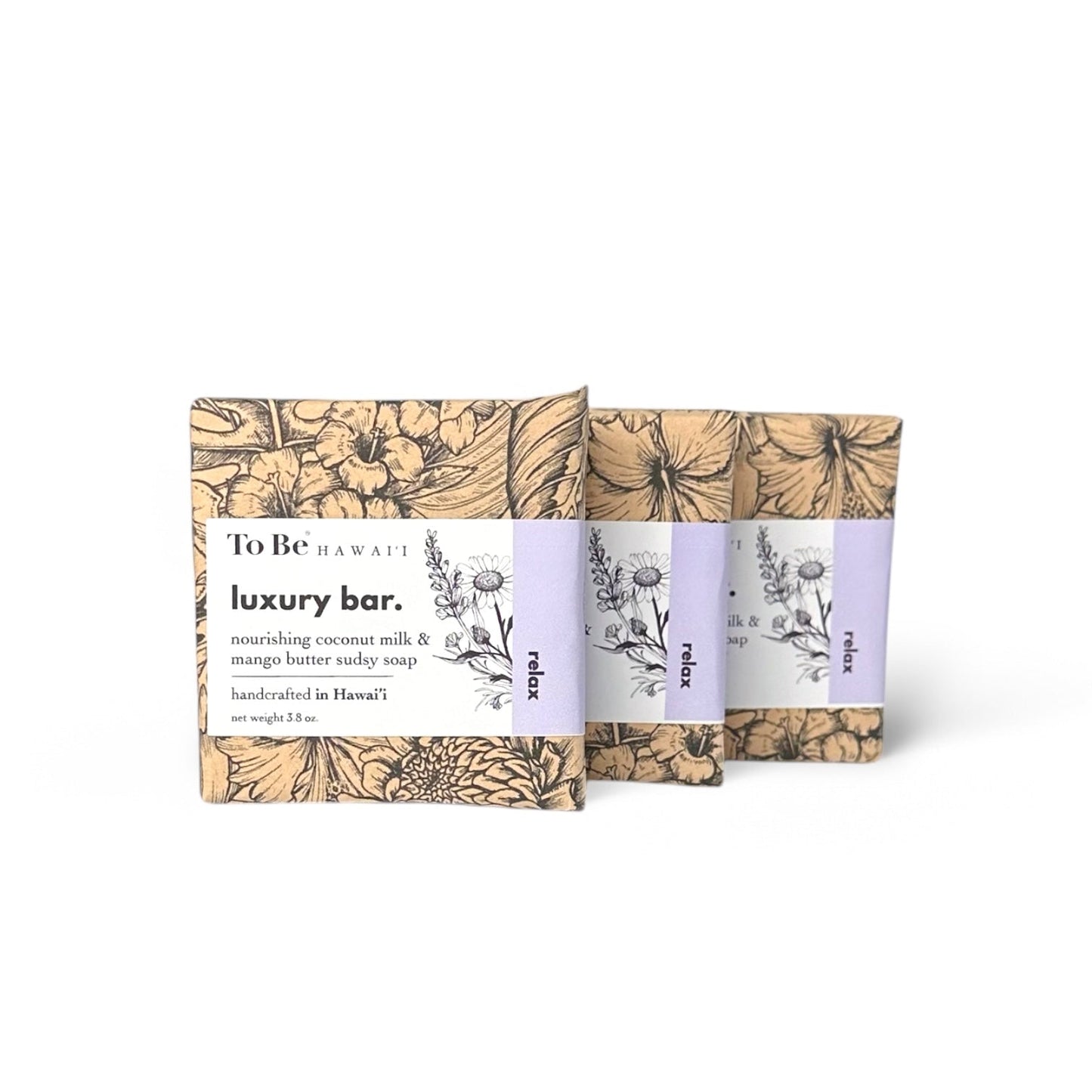 Two all natural soap bars with floral designs