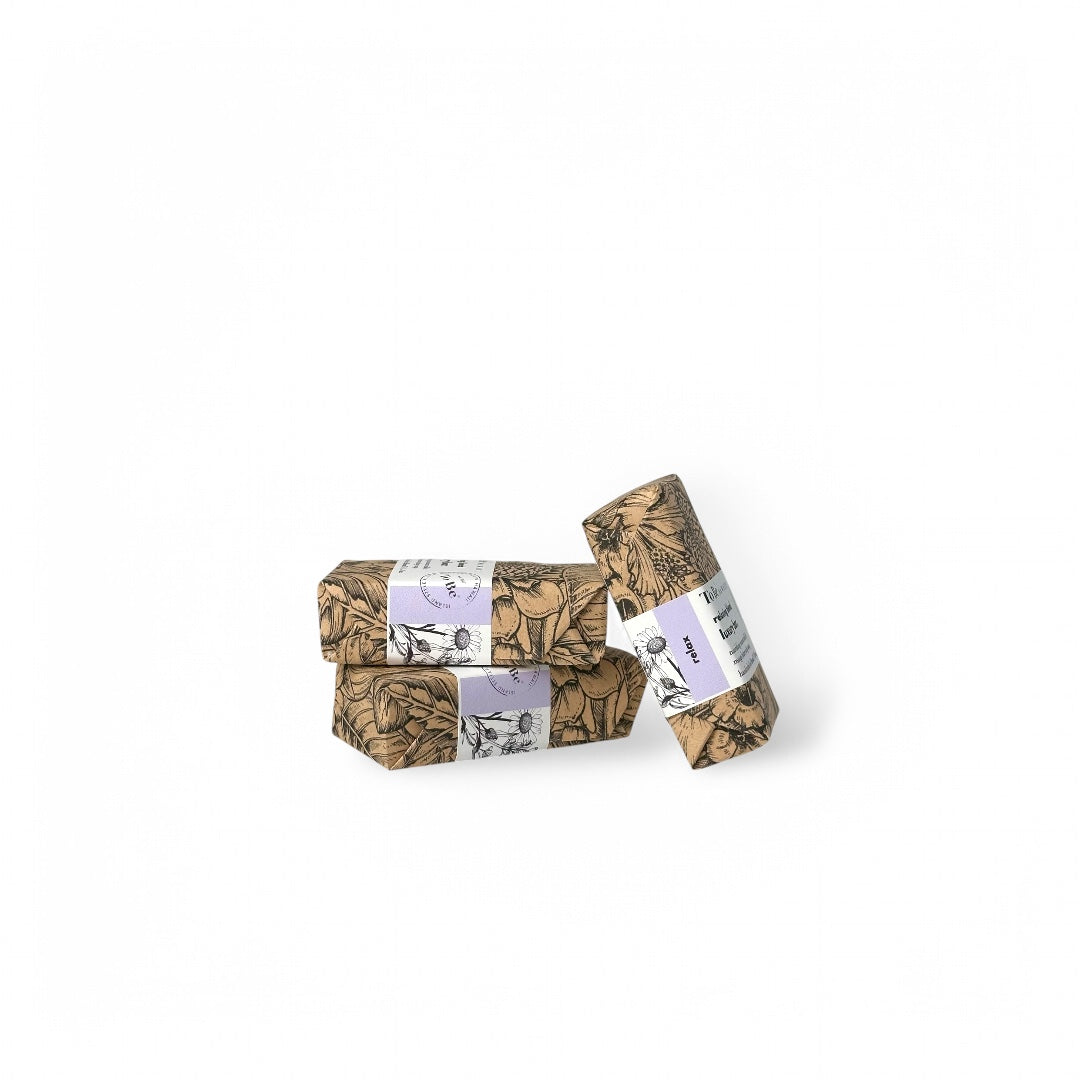 Three soap bars with decorative wrapping for sensitive skin