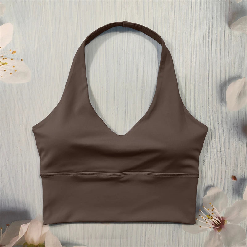 Brown halter top on a light wooden surface