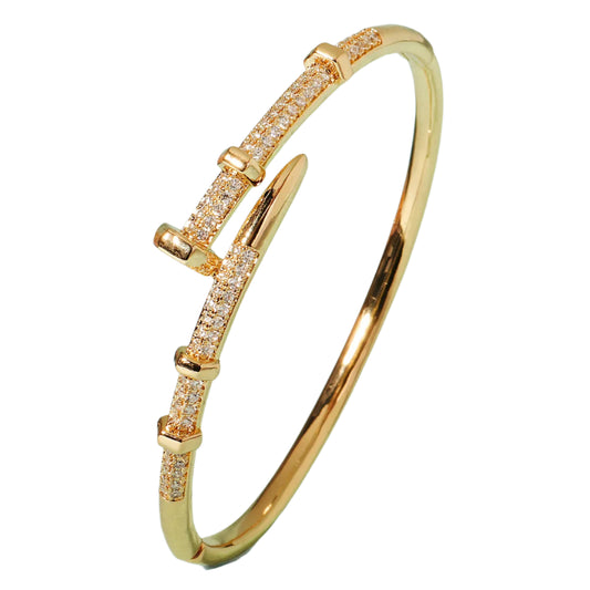 Gold bracelet with diamond accents Gold bracelet with diamond accents