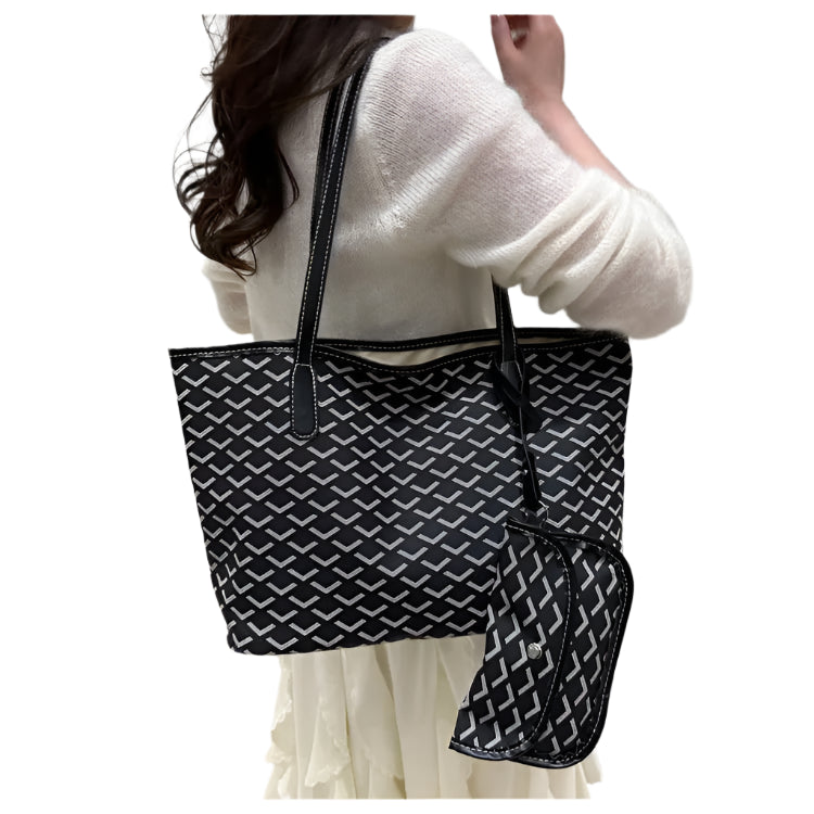 water‑resistant black and white travel bag