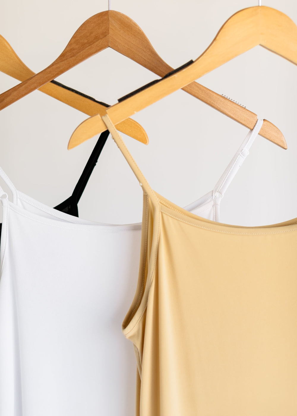 Essential adjustable slip for women, in black, white, and nude