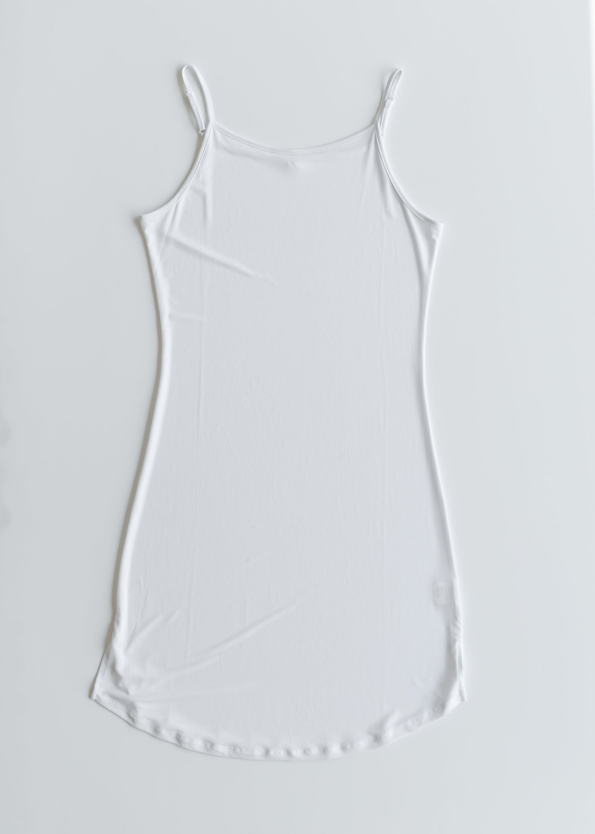 White tank top on a light gray background