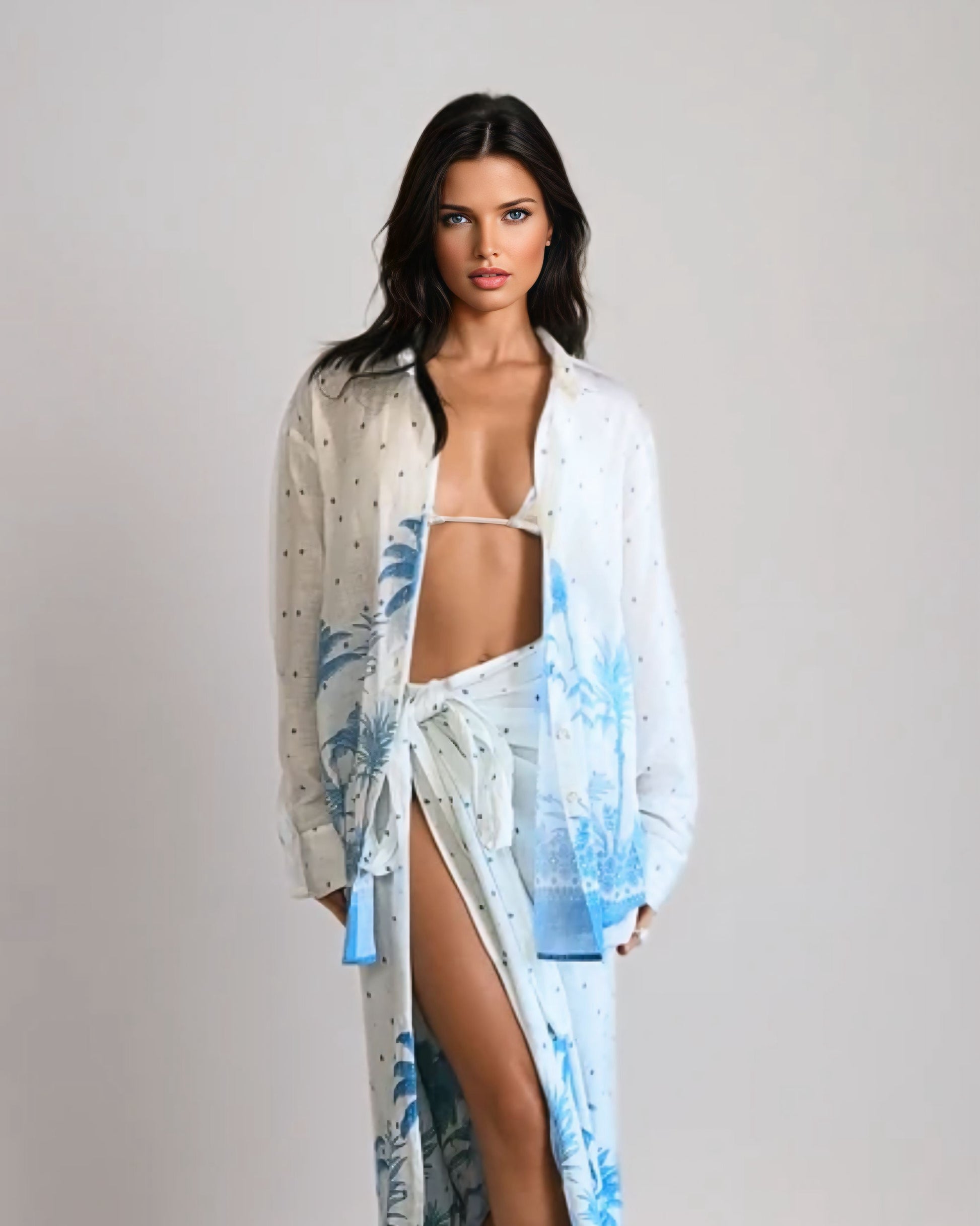 Woman wearing a white and blue floral cover-up