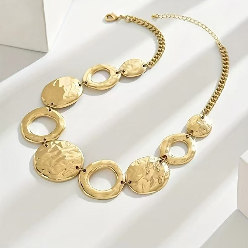 Gold necklace with circular pendants
