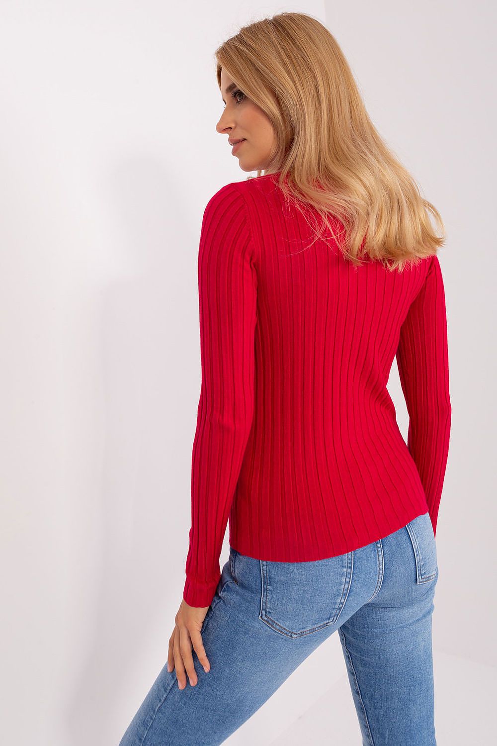 red sweater and blue jeans