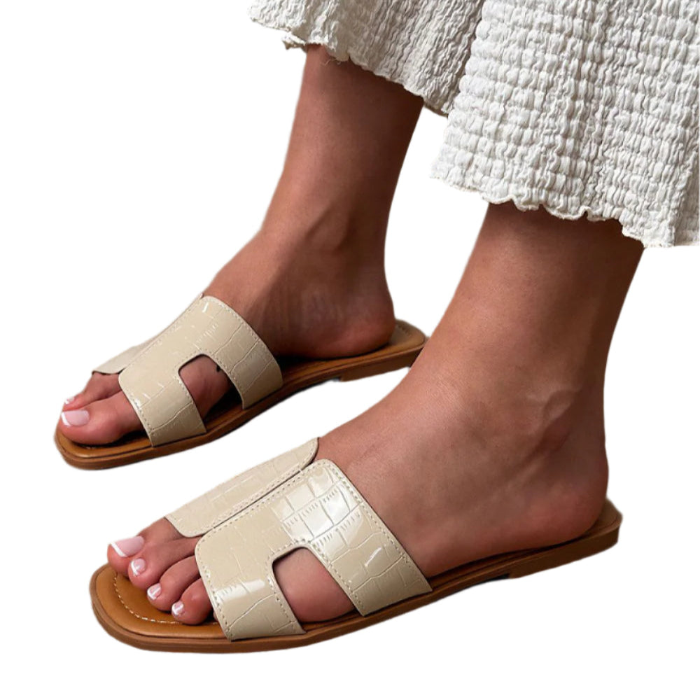 beige eco‑leather embossed sandals