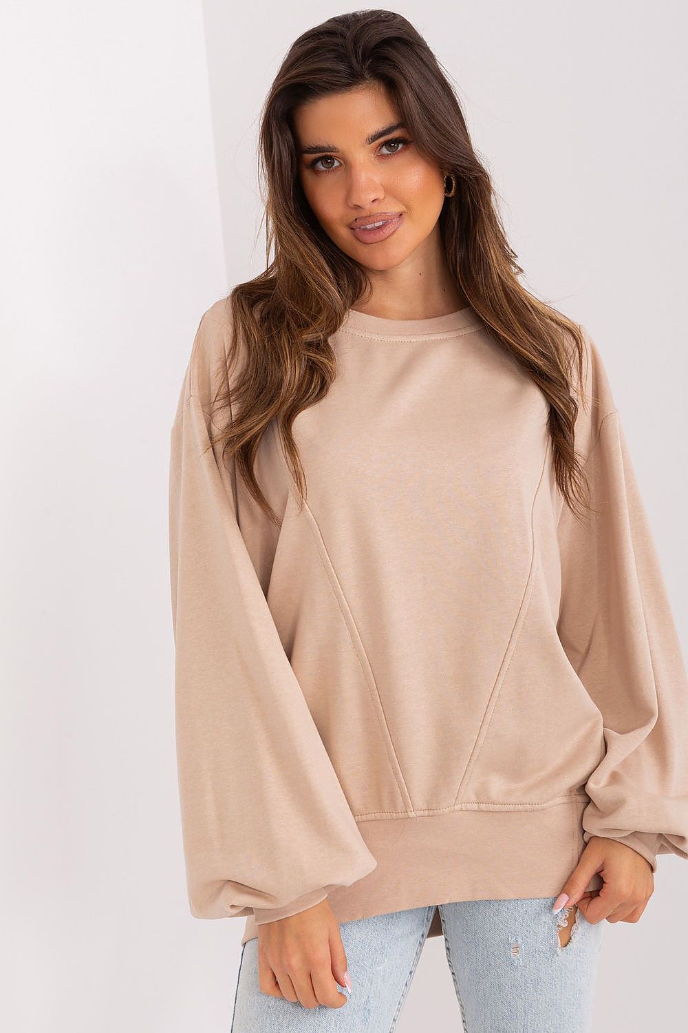 oversize beige sweater with wide sleeves