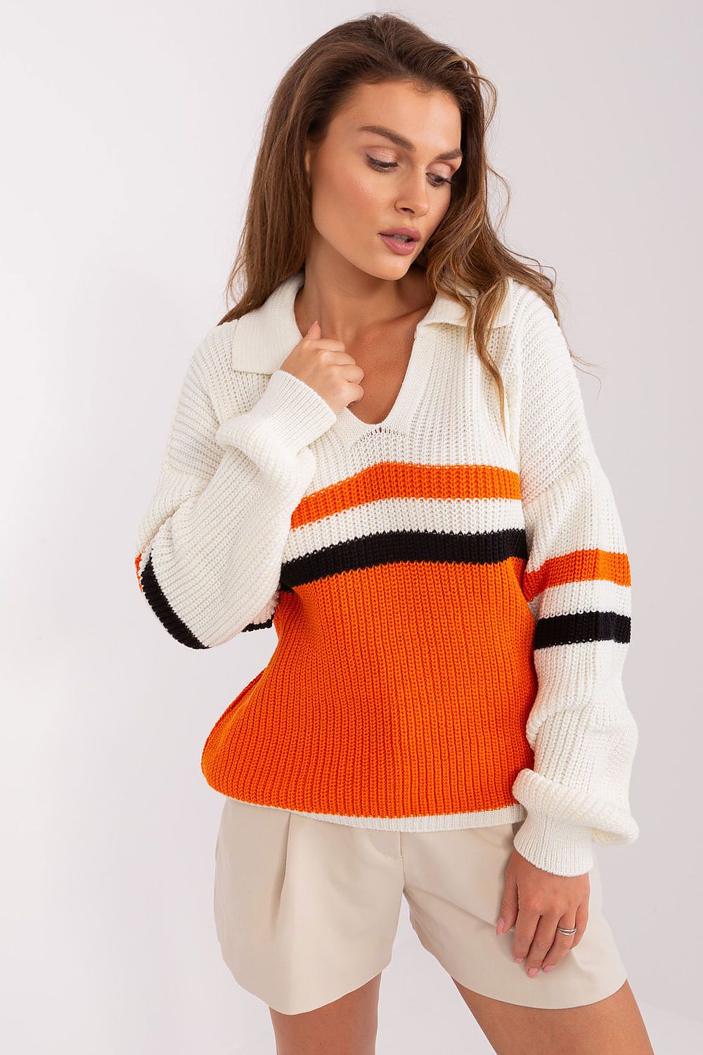 Woman showcasing the cozy and lightweight Badu acrylic sweater