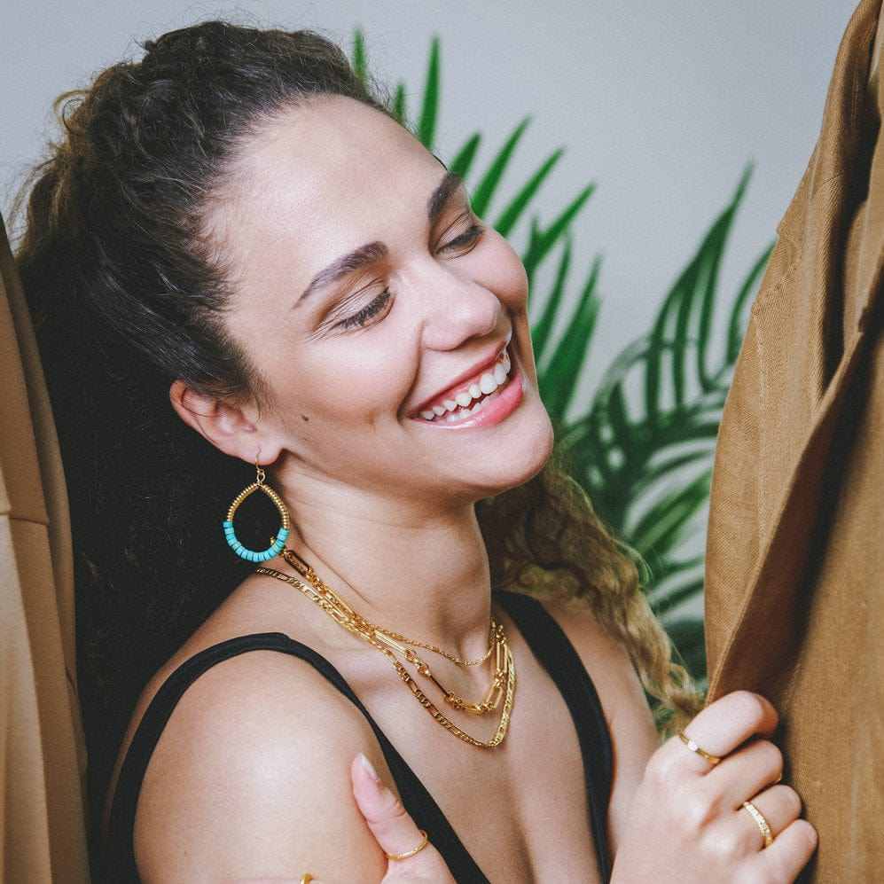 Gold collarbone chain necklace on model front view