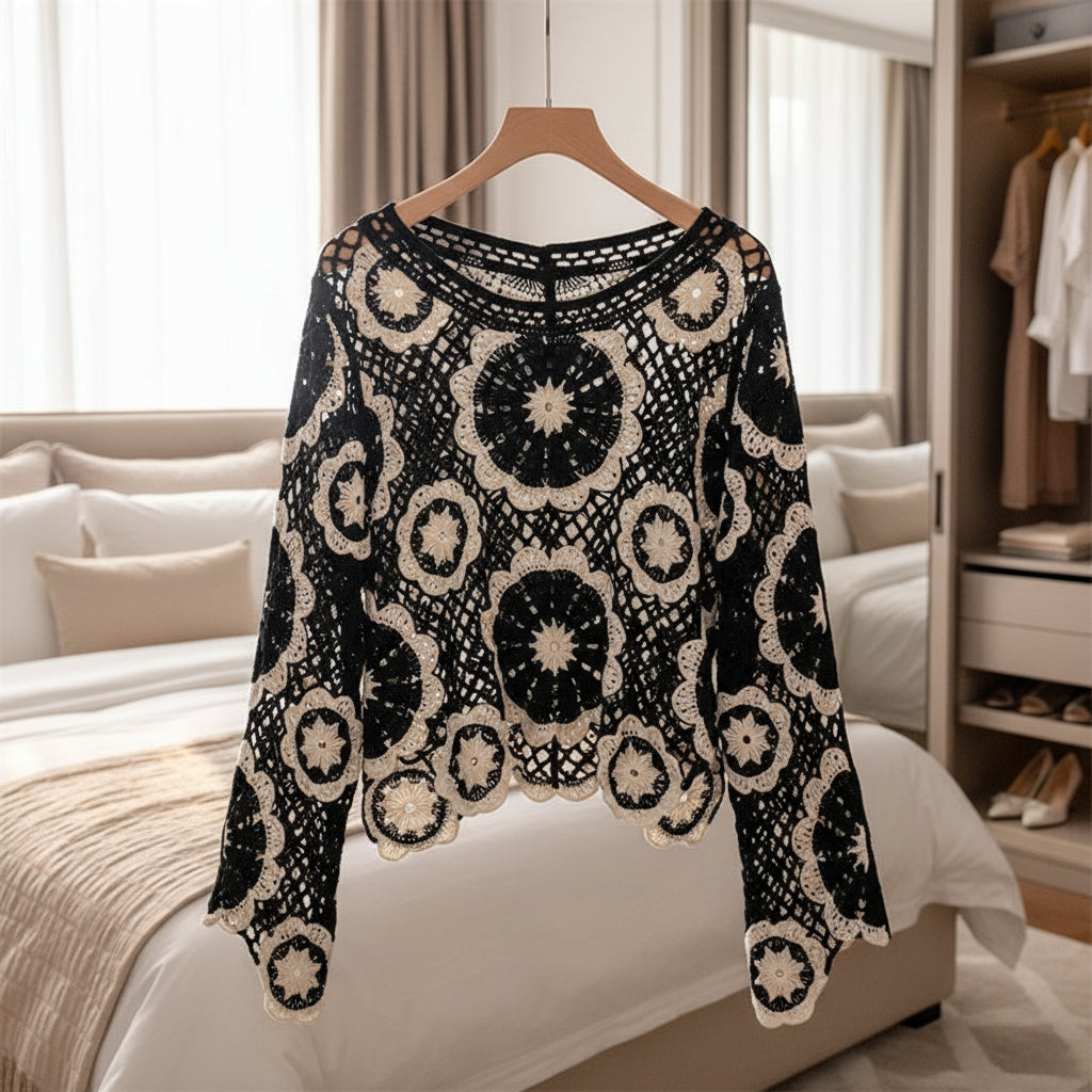 Black geometric pattern sweater showing flattering one size fit