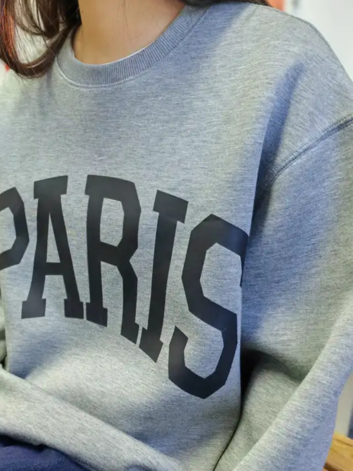 a grey sweatshirt