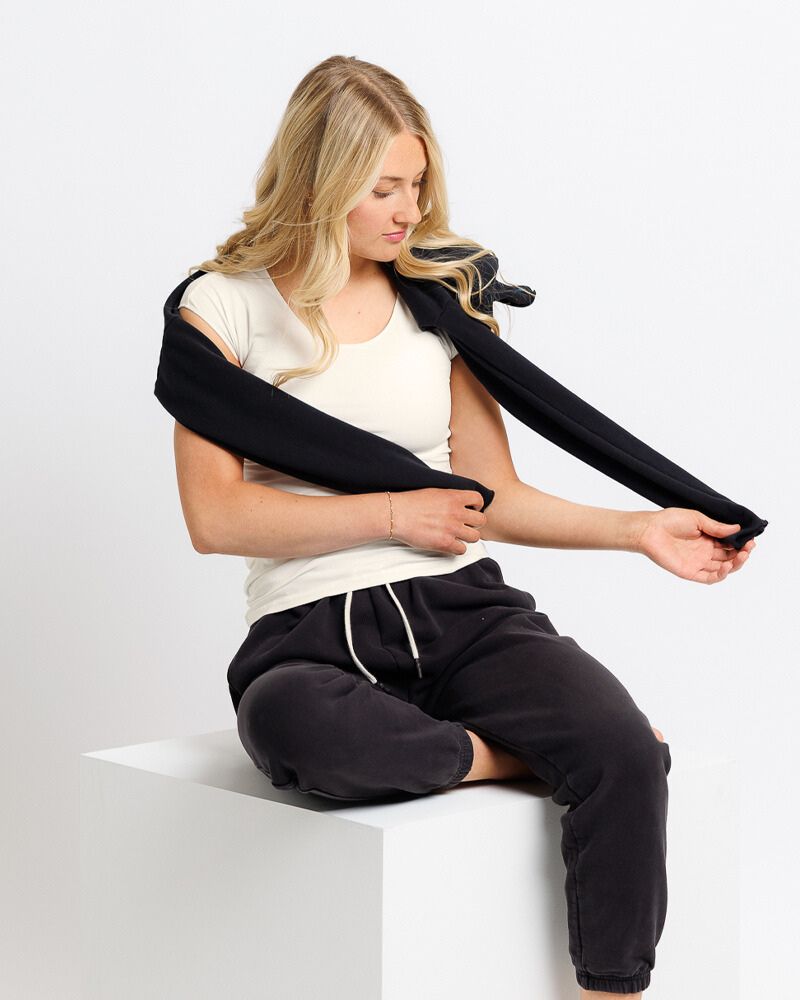 Soft fitted cotton tee with short cap sleeves and a black pants