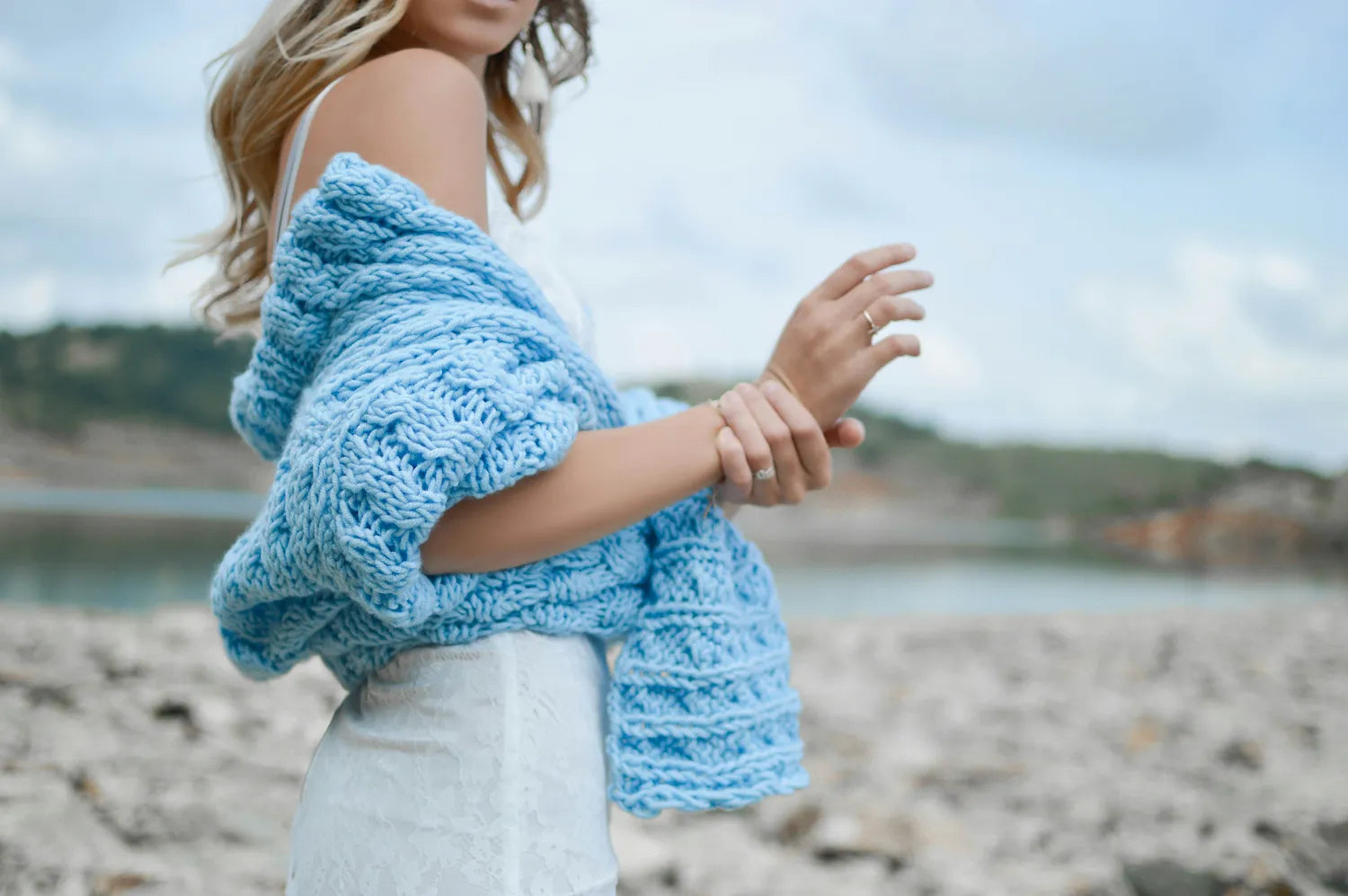 Affordable fashion - Woman wearing stylish blue knitted shawl