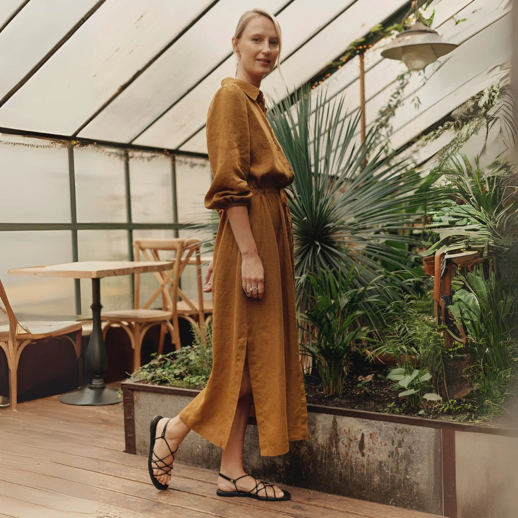 a woman wearing  a Linen Tales designer european dress 